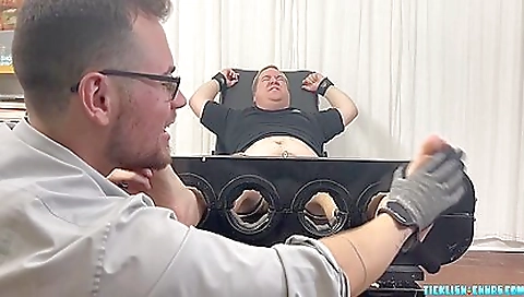 Sexy young winter remote in black lingerie and foot worship